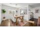 Light and bright dining room with a wooden table and chairs at 2885 Hudson St, Denver, CO 80207