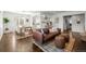 Dining area with hardwood floors and view into the kitchen at 2885 Hudson St, Denver, CO 80207