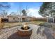 Brick fire pit in backyard patio area at 2885 Hudson St, Denver, CO 80207