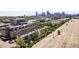 A stunning Denver, Colorado aerial view showcasing modern townhomes and the city skyline at 3133 Blake St # 3, Denver, CO 80205