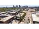 Aerial view displays Denver neighborhood near downtown, featuring industrial buildings and tree-lined streets at 3133 Blake St # 3, Denver, CO 80205
