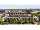 Exterior view of modern townhomes with city skyline in the background at 3133 Blake St # 3, Denver, CO 80205