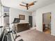 Large flex room with piano, exercise equipment, and access to a bathroom at 3133 Blake St # 3, Denver, CO 80205