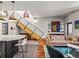This is an open concept floor plan with the kitchen island flowing into the living room at 3133 Blake St # 3, Denver, CO 80205