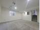 Spacious basement features neutral carpet, stairs to first floor, and recessed lighting at 1250 Acropolis Dr, Lafayette, CO 80026
