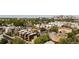 Aerial view showcasing townhomes and city skyline at 1260 N Stuart St # 2, Denver, CO 80204