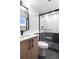 Bathroom with a walk-in shower, toilet and modern vanity at 1260 N Stuart St # 2, Denver, CO 80204