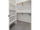 Large walk-in closet with shelves and hanging rods at 1260 N Stuart St # 2, Denver, CO 80204