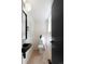 Chic powder room with floating vanity and light wood floors at 1260 N Stuart St # 2, Denver, CO 80204