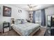 Bedroom with king-size bed and ceiling fan at 7097 S Patsburg Way, Aurora, CO 80016