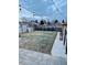 Backyard with a grassy area, string lights, and a concrete patio at 3126 S Franklin St, Englewood, CO 80113