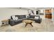 Spacious basement Gathering room with a sectional sofa and a cozy atmosphere at 3126 S Franklin St, Englewood, CO 80113