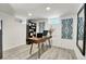 Basement home office with a desk, chair, and built-in shelving at 3126 S Franklin St, Englewood, CO 80113