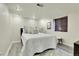 Basement bedroom with a window, light flooring, and a neutral color scheme at 3126 S Franklin St, Englewood, CO 80113