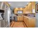 Well-equipped kitchen featuring stainless steel appliances and ample cabinetry at 3126 S Franklin St, Englewood, CO 80113