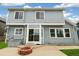 A concrete patio and brick fire pit complete the backyard of this home at 15762 Olmsted Pl, Denver, CO 80239