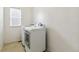 This laundry room is equipped with a washer and dryer ready for your convenience at 15762 Olmsted Pl, Denver, CO 80239