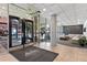 Condo lobby with comfortable seating and access to the outside at 2 Adams St # 1401, Denver, CO 80206