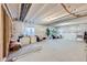 Unfinished basement with carpet, window, and room for storage at 9099 Sedalia St, Commerce City, CO 80022
