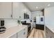 Modern kitchen with stainless steel appliances and updated countertops at 9099 Sedalia St, Commerce City, CO 80022