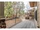 View of the spacious back deck overlooking a natural setting, perfect for relaxation at 7132 S Irvington Ct, Aurora, CO 80016