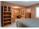 Bedroom with windows and desk with chair at 7132 S Irvington Ct, Aurora, CO 80016