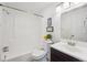 Well-lit bathroom with a clean, functional design including a shower and vanity at 1177 S Troy St, Aurora, CO 80012