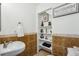 Cozy bathroom with a decorative shelf and a stylish sink at 1177 S Troy St, Aurora, CO 80012