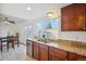 Bright kitchen with stainless steel appliances and granite countertops, perfect for cooking at 1177 S Troy St, Aurora, CO 80012