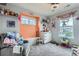 Charming bedroom with soft gray carpet and display shelves for stuffed animal collections at 24748 E Layton Pl, Aurora, CO 80016