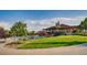 Enjoy this community clubhouse and pool with a stone fireplace overlooking the green space at 24748 E Layton Pl, Aurora, CO 80016