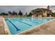 A community pool features lap lanes and a clubhouse in a meticulously landscaped setting at 24748 E Layton Pl, Aurora, CO 80016