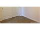 Small bedroom with neutral carpet and sliding closet doors at 804 Summer Hawk Dr # 6105, Longmont, CO 80504