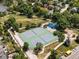 An aerial view of community tennis courts and playground, providing a clear picture of the facilities at 6293 Braun Cir, Arvada, CO 80004