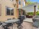 Outdoor patio featuring dining furniture, grill, and a pergola covered hot tub at 6293 Braun Cir, Arvada, CO 80004