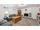 Cozy basement featuring a fireplace, comfortable seating, and a relaxed ambiance, perfect for Gathering gatherings at 721 Park Ln, Lakewood, CO 80214