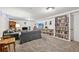 Finished basement offers a comfortable living space with built-in bookshelves and a cozy fireplace, great for entertainment at 721 Park Ln, Lakewood, CO 80214