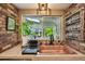 Cozy kitchen with a copper sink, brick accents, and a window view, perfect for culinary enthusiasts at 721 Park Ln, Lakewood, CO 80214