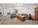 Spacious living room featuring neutral walls, carpeting, recessed lighting, and comfortable seating arrangement at 721 Park Ln, Lakewood, CO 80214