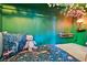 Close-up of play nook, with cozy decorations, whimsical lighting and imaginative decor at 721 Park Ln, Lakewood, CO 80214