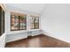 Cozy room with hardwood floors, natural light, and built-in bench seating at 980 S Dahlia St # A, Denver, CO 80246