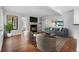 Bright living room with fireplace, built-in shelves, and modern furniture at 980 S Dahlia St # A, Denver, CO 80246