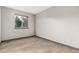 Bedroom with natural light, wood floors and neutral paint at 10172 Woodrose Ln, Highlands Ranch, CO 80129