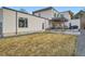 A back exterior view of the house that features the patio area at 4795 Highline Pl, Denver, CO 80222