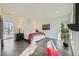 Light-filled main bedroom featuring a comfortable bed, stylish decor, and a relaxing atmosphere at 4795 Highline Pl, Denver, CO 80222