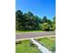 Picturesque park across from home with walking paths, lush trees, and picnic spots at 4795 Highline Pl, Denver, CO 80222