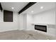 Unfinished basement with recessed lighting and electric fireplace at 16530 Timber Cove St, Hudson, CO 80642