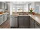 Kitchen with stainless steel appliances and double sink at 16530 Timber Cove St, Hudson, CO 80642