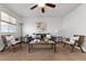 Living room featuring a neutral color palette and cozy seating at 16530 Timber Cove St, Hudson, CO 80642