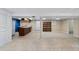 Finished basement has open space, kitchenette, and tons of potential at 4627 S Norfolk Way, Aurora, CO 80015